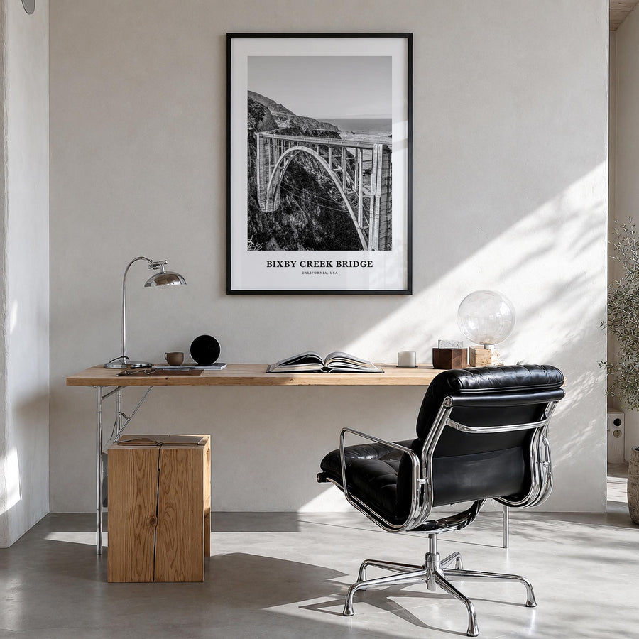 Bixby Creek Bridge black & white classic poster of California, USA – vertical wall art in black wood frame, hanging on wall