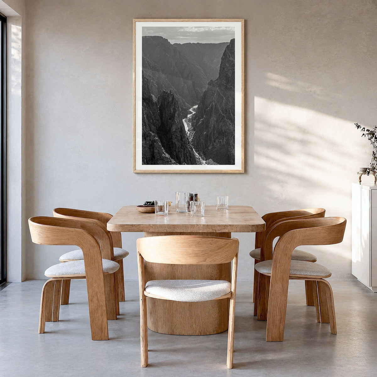 Black Canyon of the Gunnison National Park Photo Poster in a natural wood frame, hanging in a dining room, white border