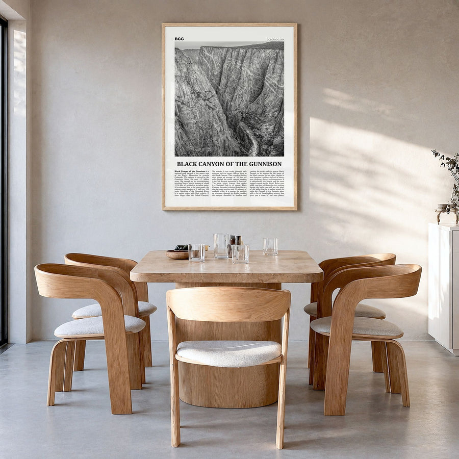 Black Canyon of the Gunnison National Park Newspaper Poster in a natural wood frame, hanging in a dining room
