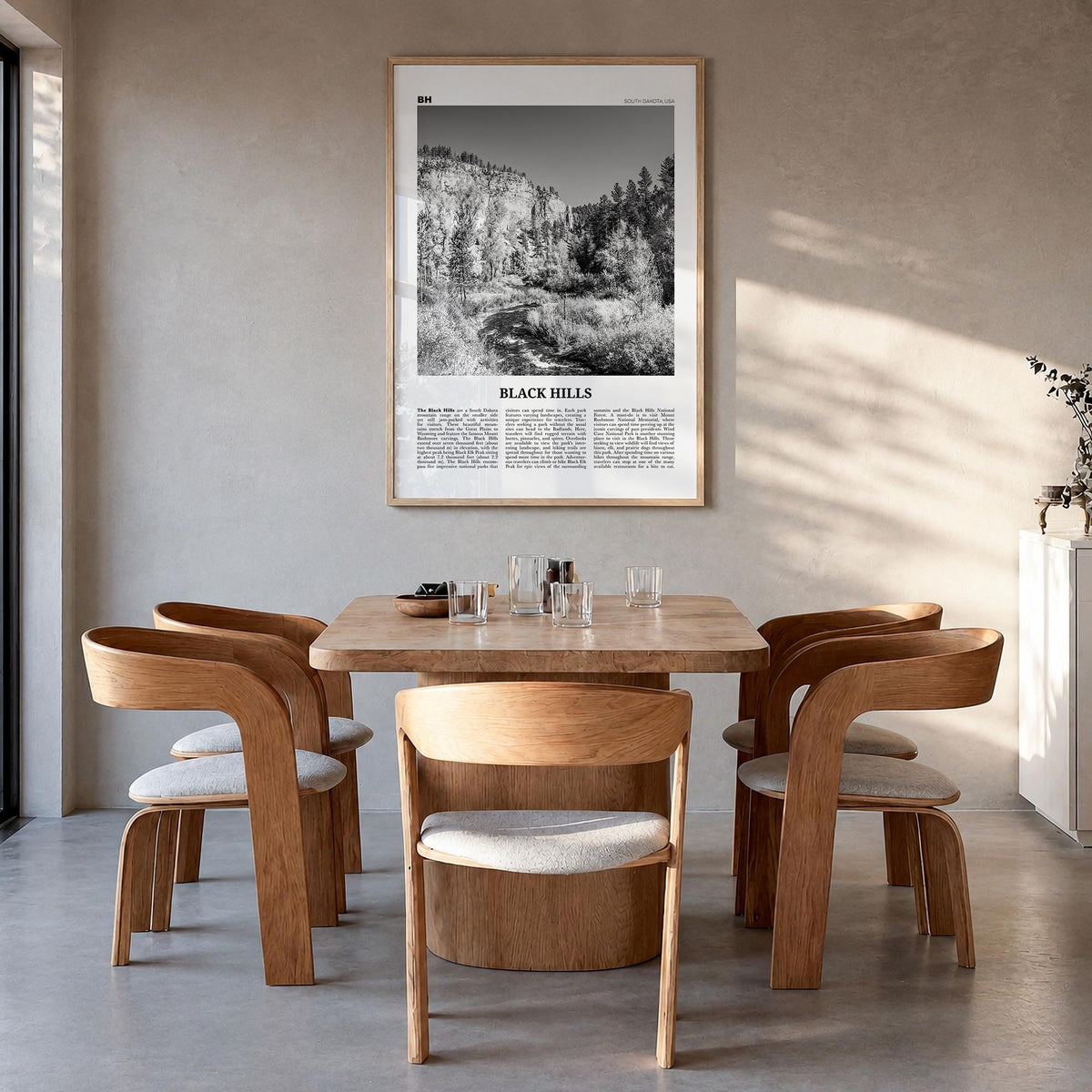 Black Hills black & white newspaper poster of South Dakota & Wyoming, USA – vertical wall art in natural wood frame, hanging 