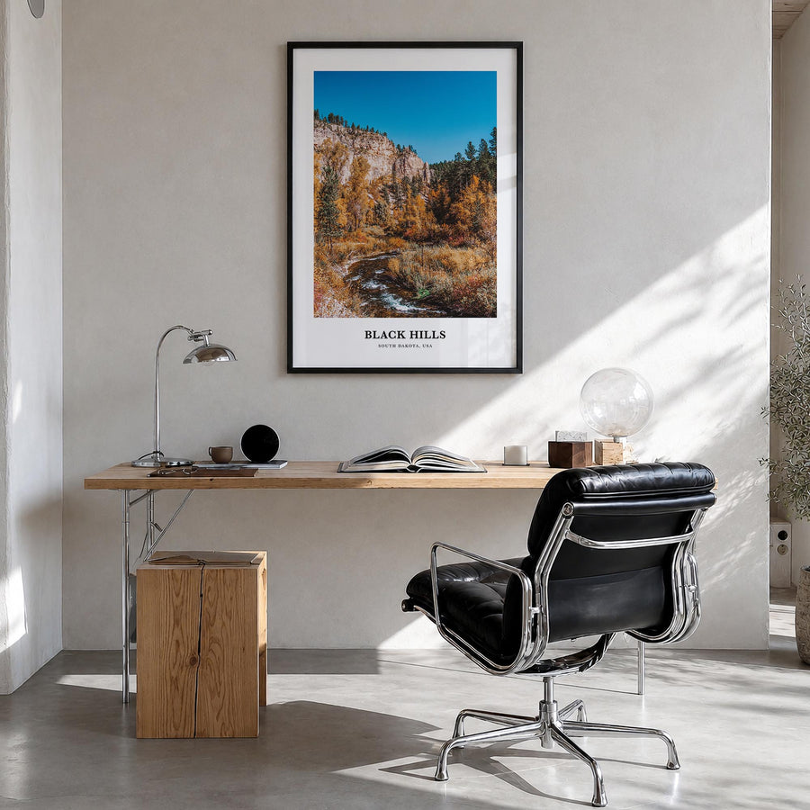 Black Hills colorful classic poster of South Dakota & Wyoming, USA – vertical wall art in black wood frame, hanging on wall