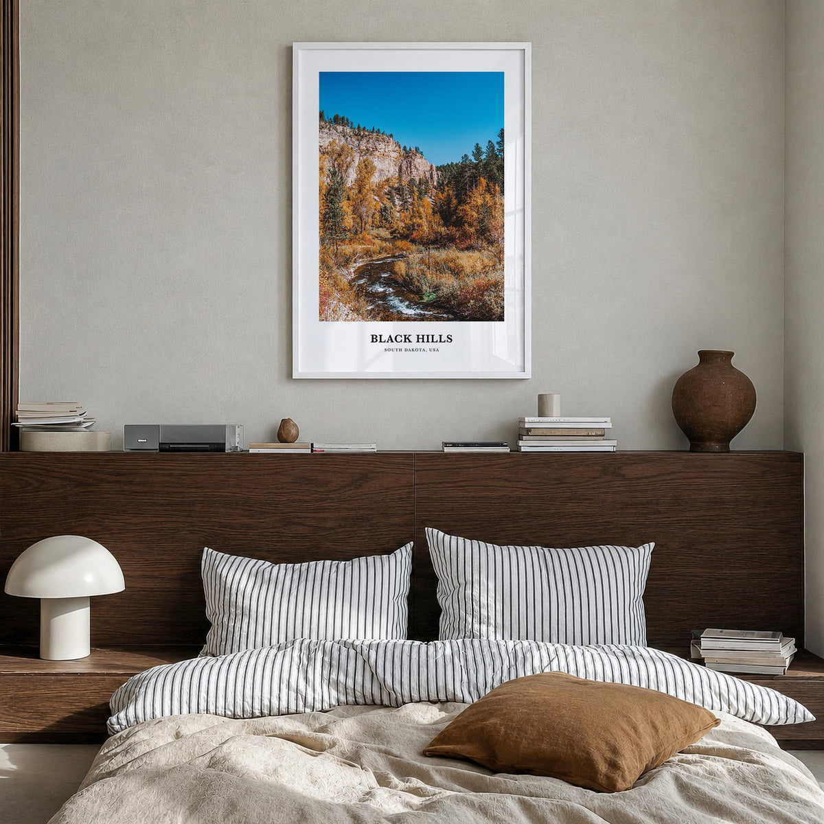 Black Hills colorful classic poster of South Dakota & Wyoming, USA – vertical wall art in white wood frame, hanging on wall