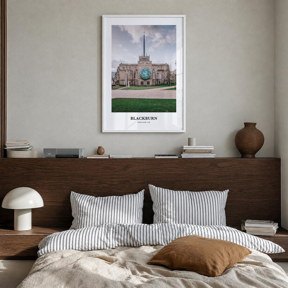 Blackburn colorful classic poster of United Kingdom – vertical wall art in white wood frame, hanging on wall