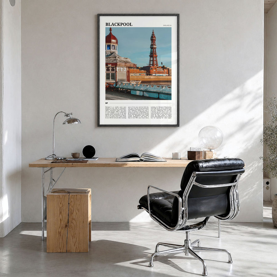 Blackpool Travel Poster in a black wood frame, hanging in a bright home office
