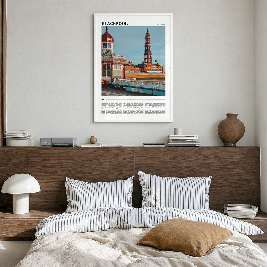 Blackpool Travel Poster in a white wood frame, hanging in a bedroom