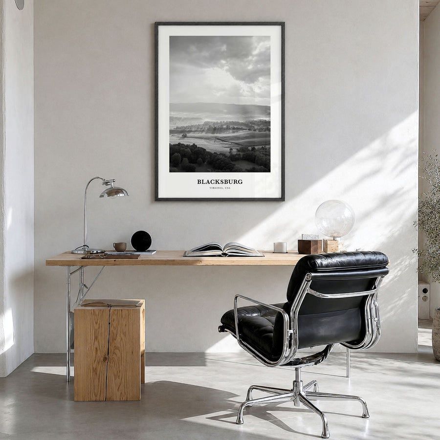 Blacksburg Classic Poster in a black wood frame, hanging in a bright home office