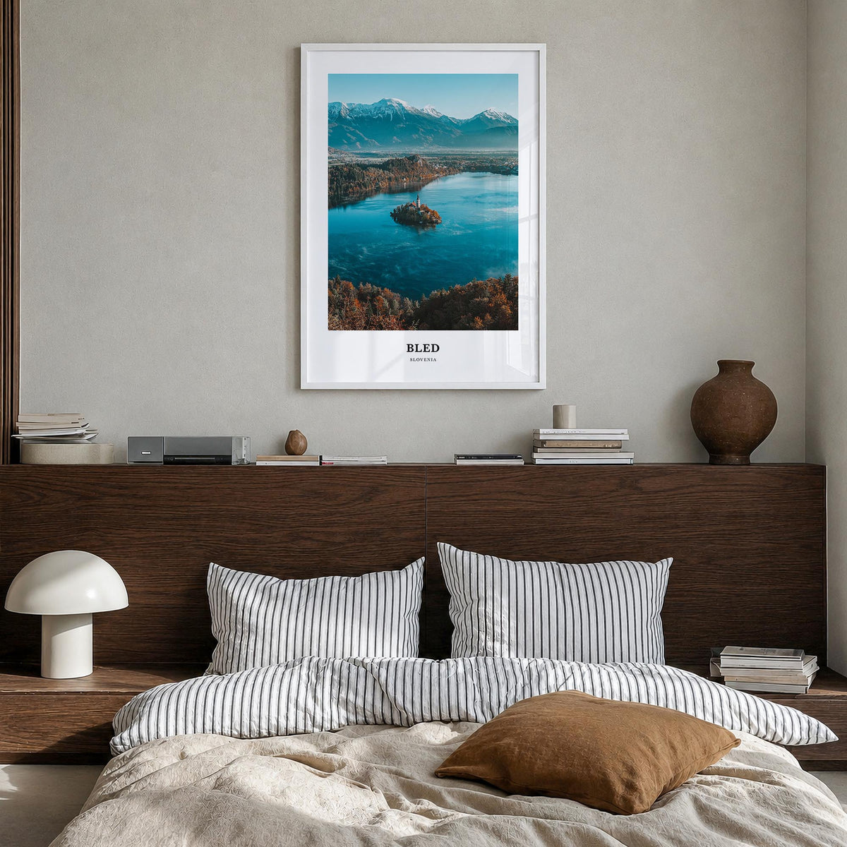 Bled colorful classic poster of Slovenia – vertical wall art in white wood frame, hanging on wall