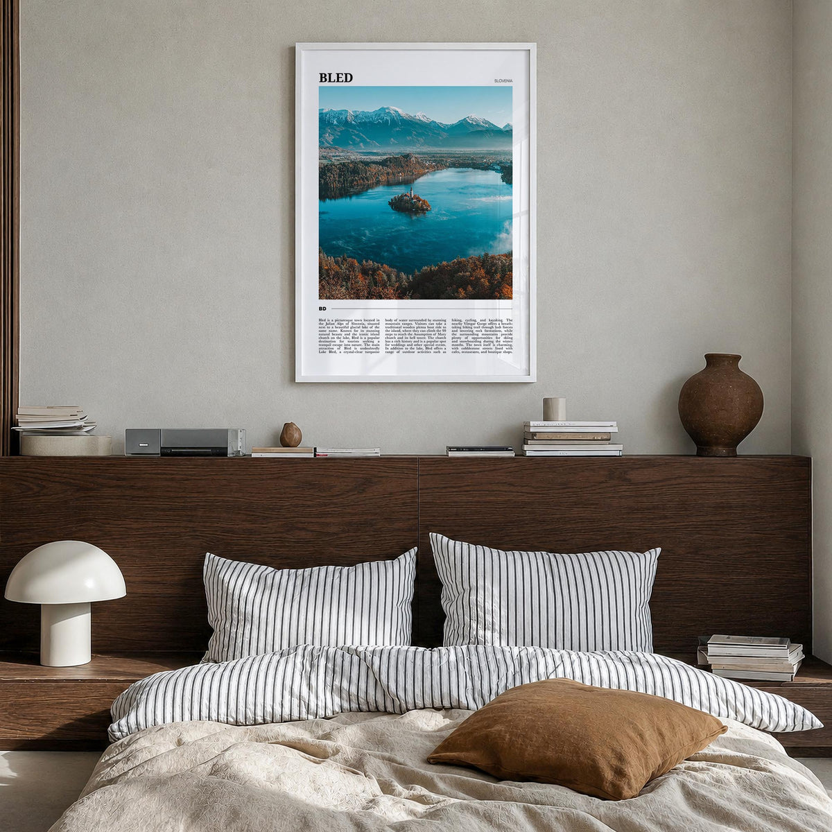 Bled colorful travel poster of Slovenia – vertical wall art in white wood frame, hanging on wall