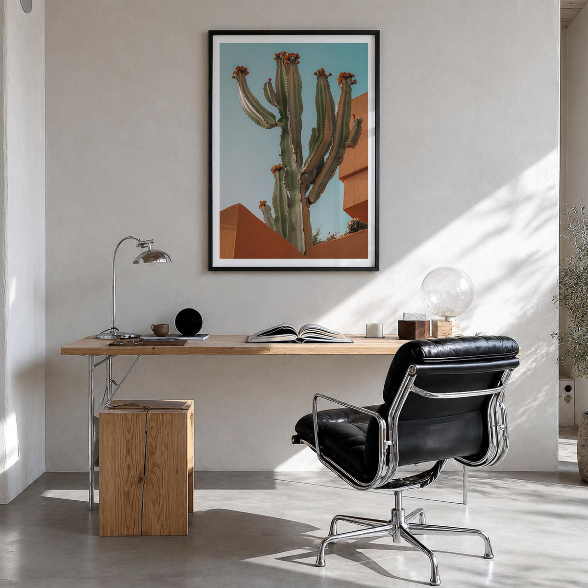 Blooming Cactus Sandy Walls colorful photo poster – vertical wall art in black wood frame with white border, hanging on wall