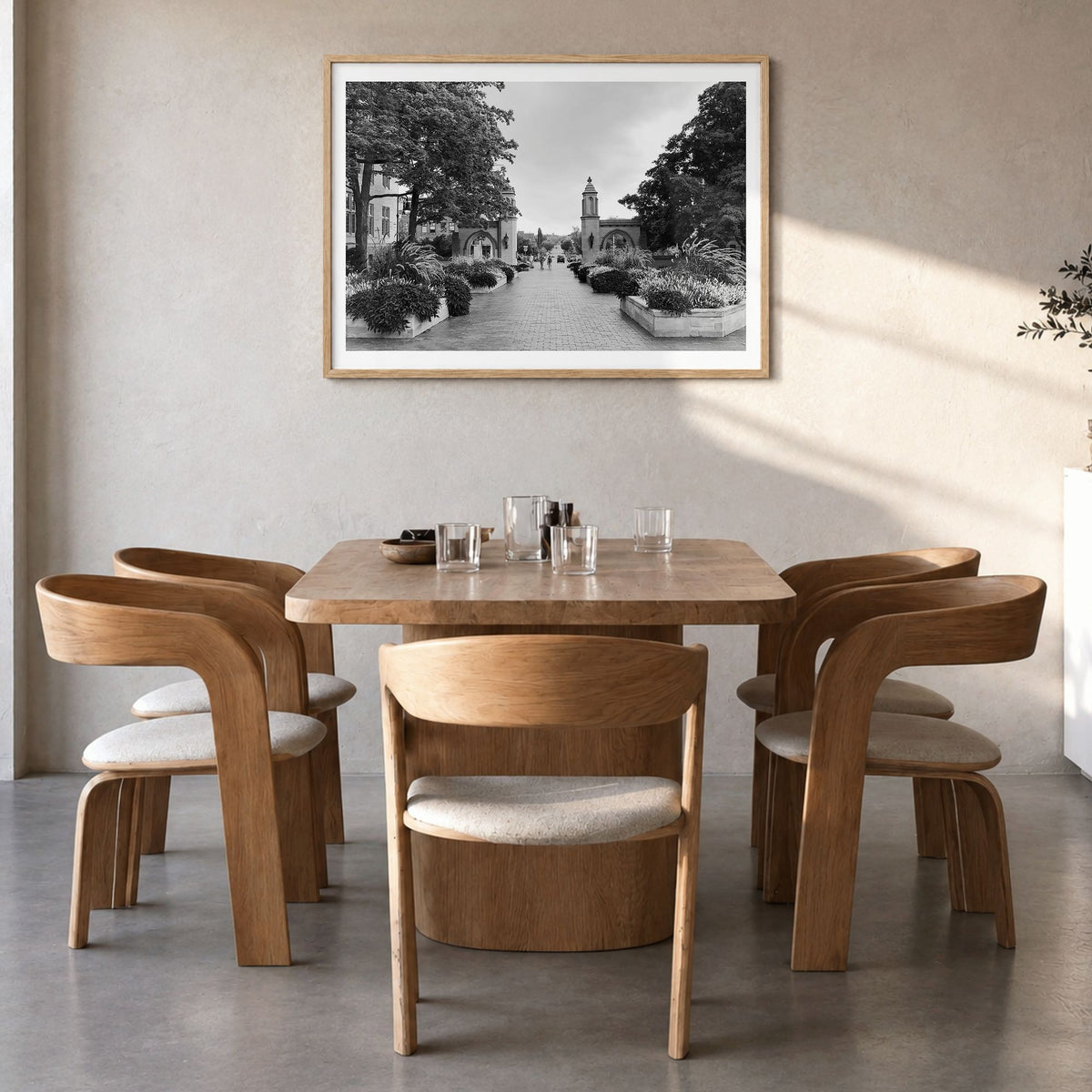 Bloomington Photo Poster in a natural wood frame, hanging in a dining room, white border
