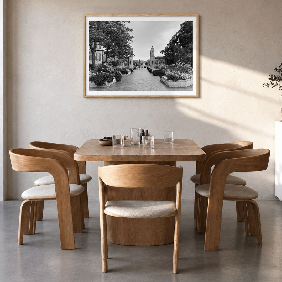 Bloomington Photo Poster in a natural wood frame, hanging in a dining room, white border