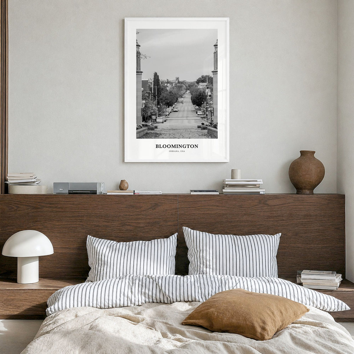 Bloomington Classic Poster in a white wood frame, hanging in a bedroom