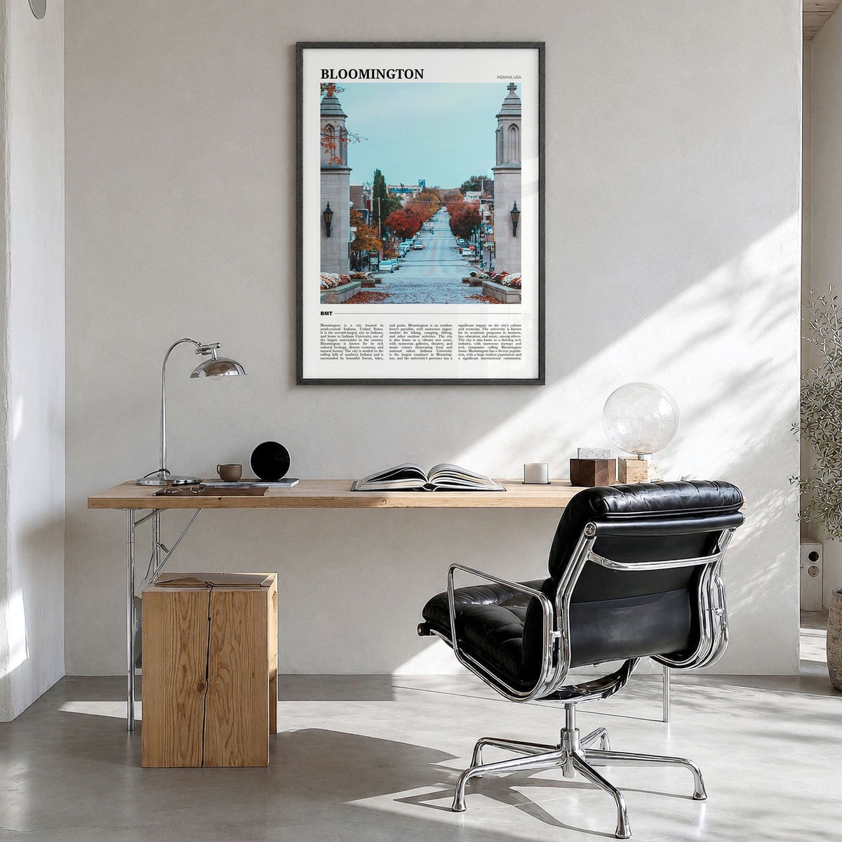 Bloomington Travel Poster in a black wood frame, hanging in a bright home office