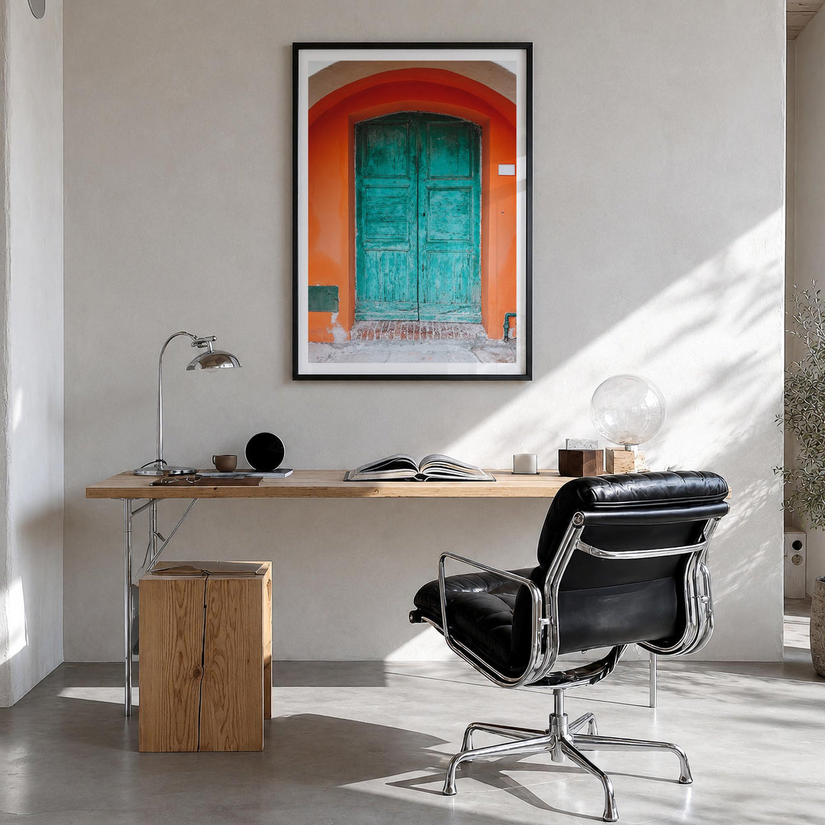 Blue Door no. 1 colorful photo poster – vertical wall art in black wood frame with white border, hanging on wall