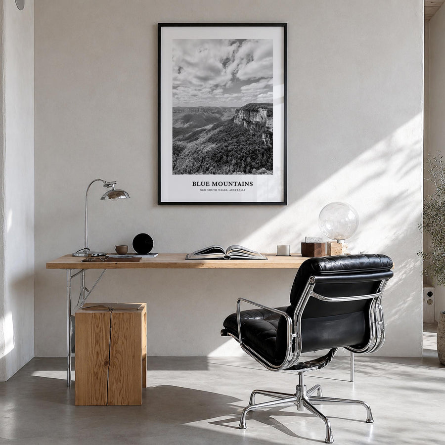 Blue Mountains black & white classic poster of Australia – vertical wall art in black wood frame, hanging on wall