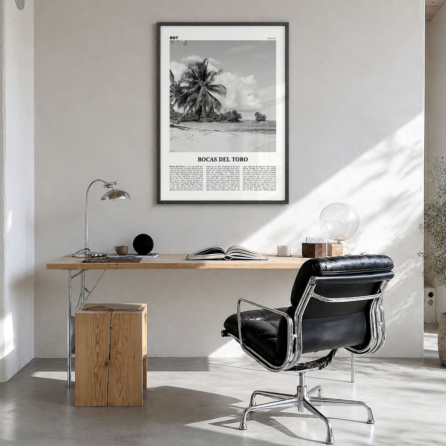 Bocas del Toro Newspaper Poster in a black wood frame, hanging in a bright home office