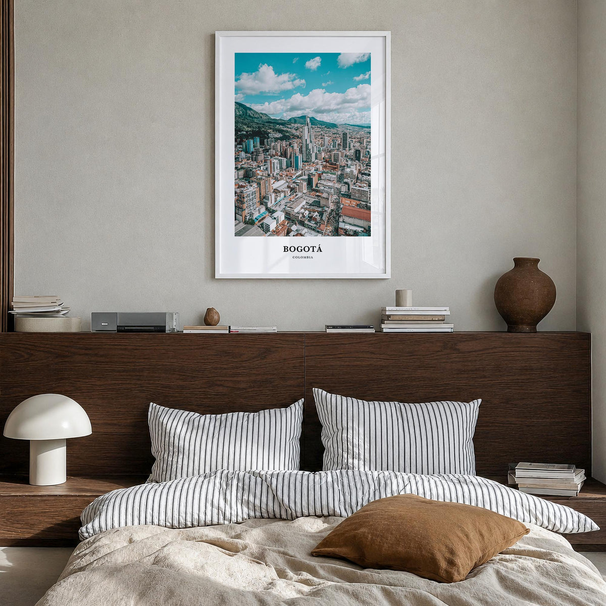 Bogotá colorful classic poster of Colombia – vertical wall art in white wood frame, hanging on wall