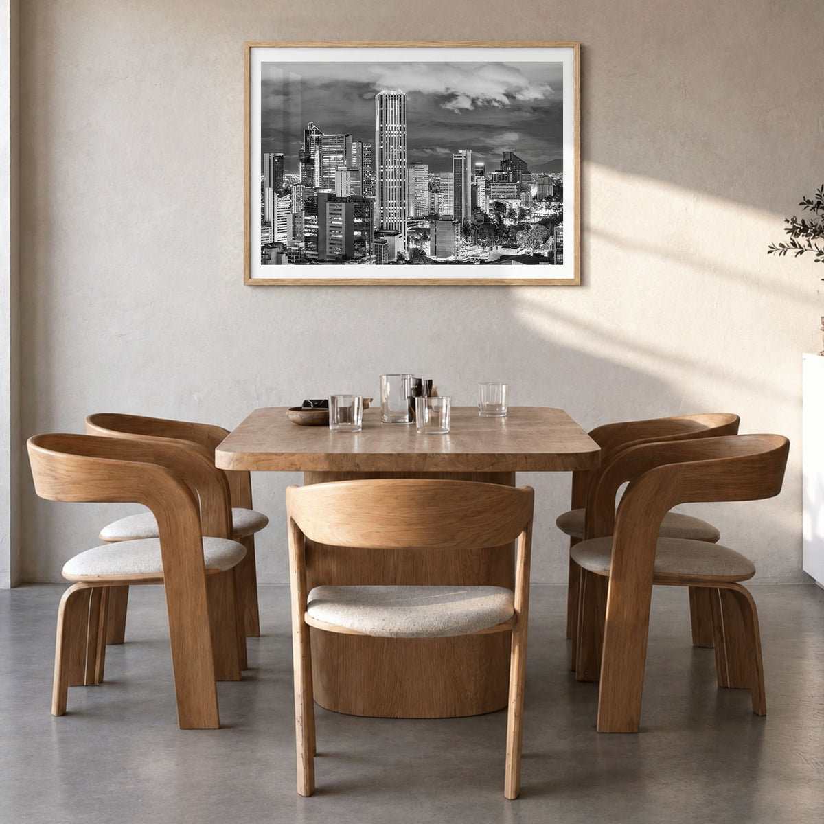 Bogotá Photo No 2 Poster in a natural wood frame, hanging in a dining room, white border