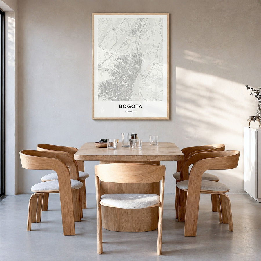 Bogotá Map Poster in a natural wood frame, hanging in a dining room