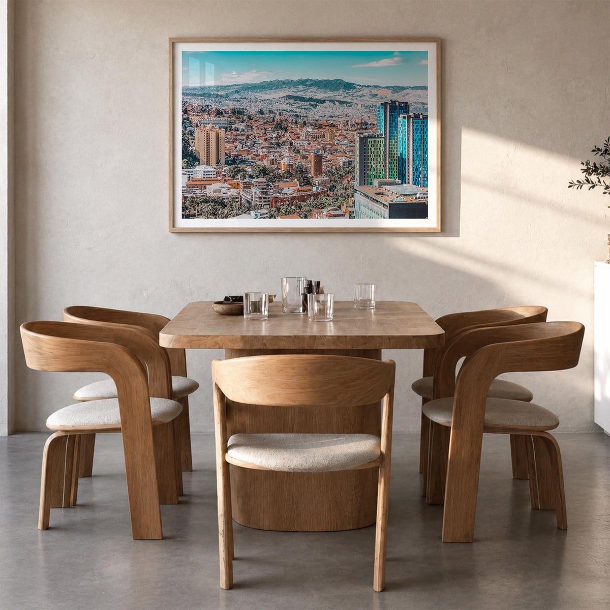 Bogotá no. 1 colorful photo poster of Colombia – horizontal wall art in natural wood frame with white border, hanging on wall