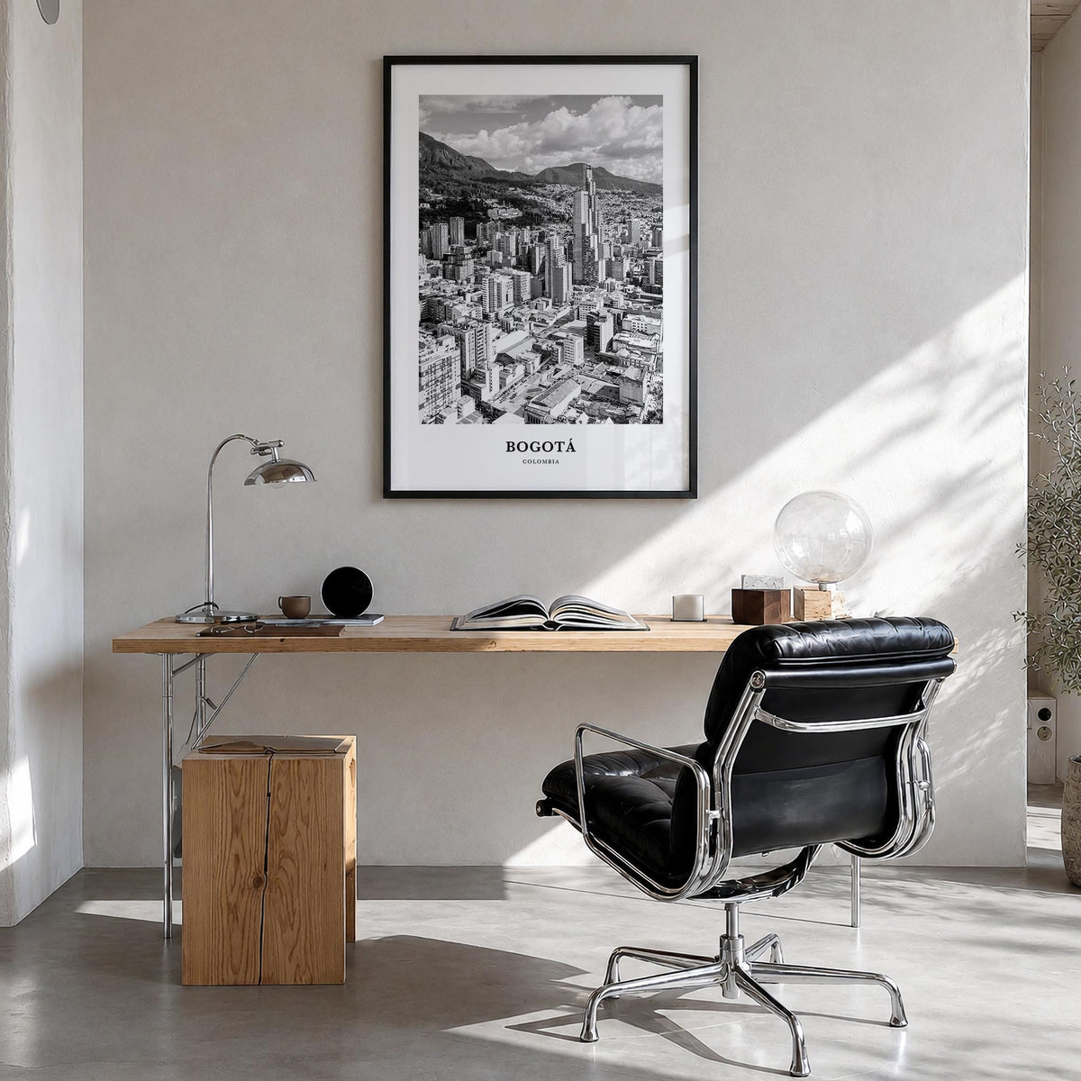 Bogotá no. 2 black & white classic poster of Colombia – vertical wall art in black wood frame, hanging on wall