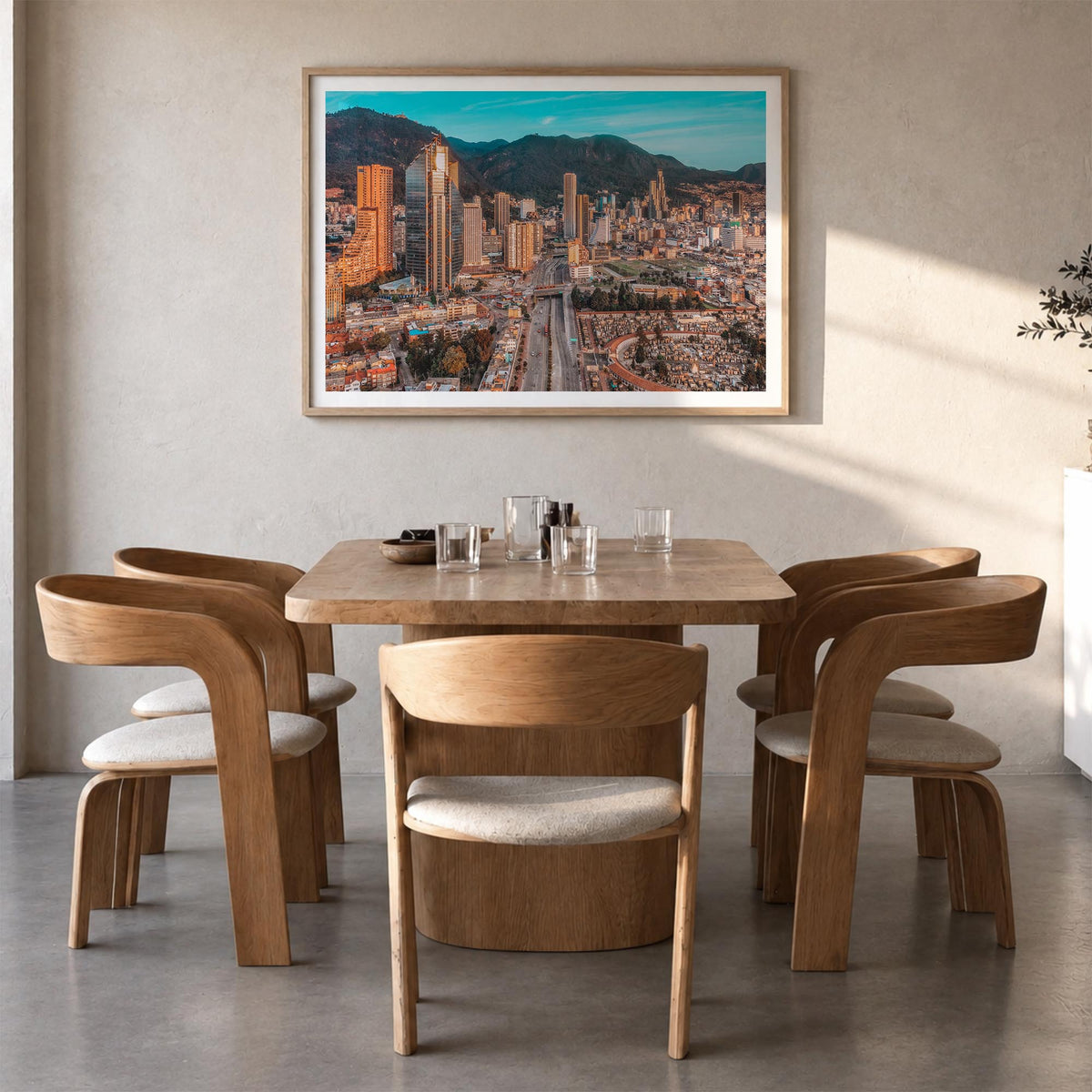 Bogotá no. 2 colorful photo poster of Colombia – horizontal wall art in natural wood frame with white border, hanging on wall