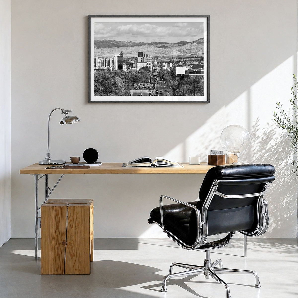 Boise Photo Poster in a black wood frame, hanging in a bright home office, white border