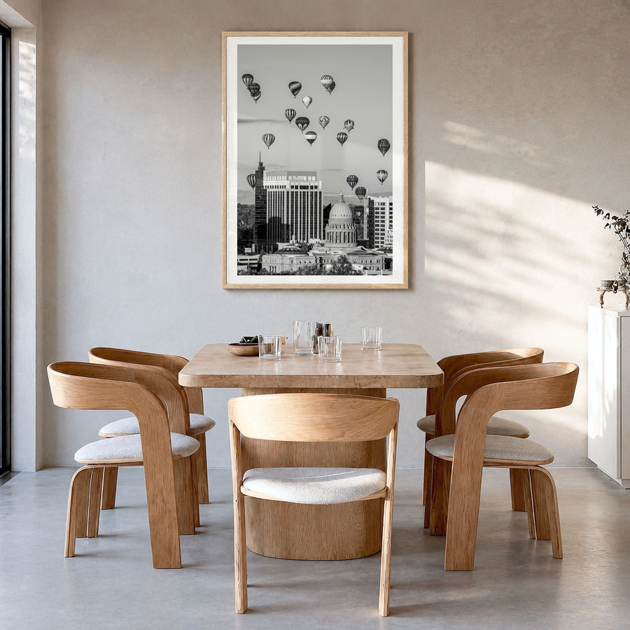 Boise Photo No 2 Poster in a natural wood frame, hanging in a dining room, white border