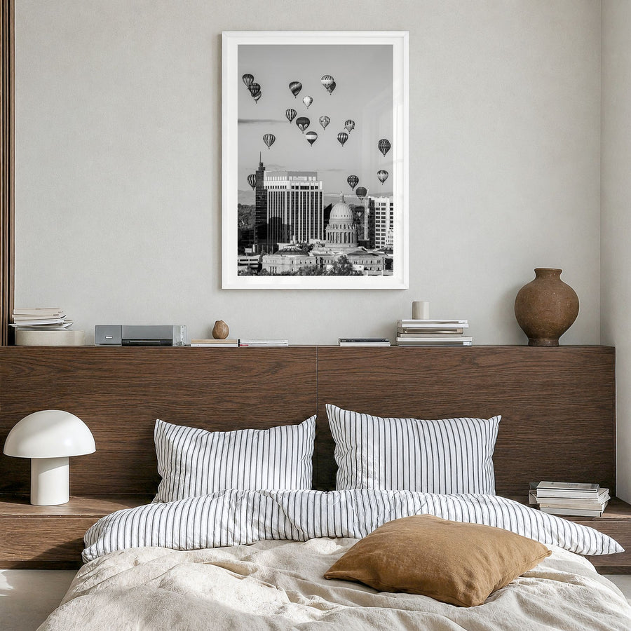 Boise Photo No 2 Poster in a white wood frame, hanging in a bedroom, white border