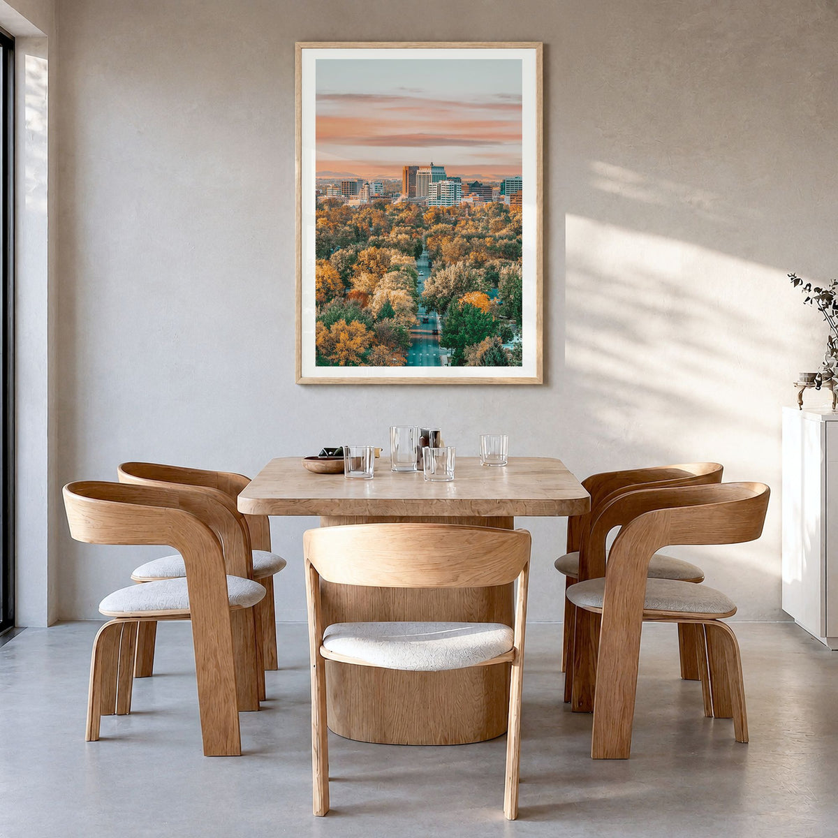 Boise Photo No 1 Poster in a natural wood frame, hanging in a dining room, white border