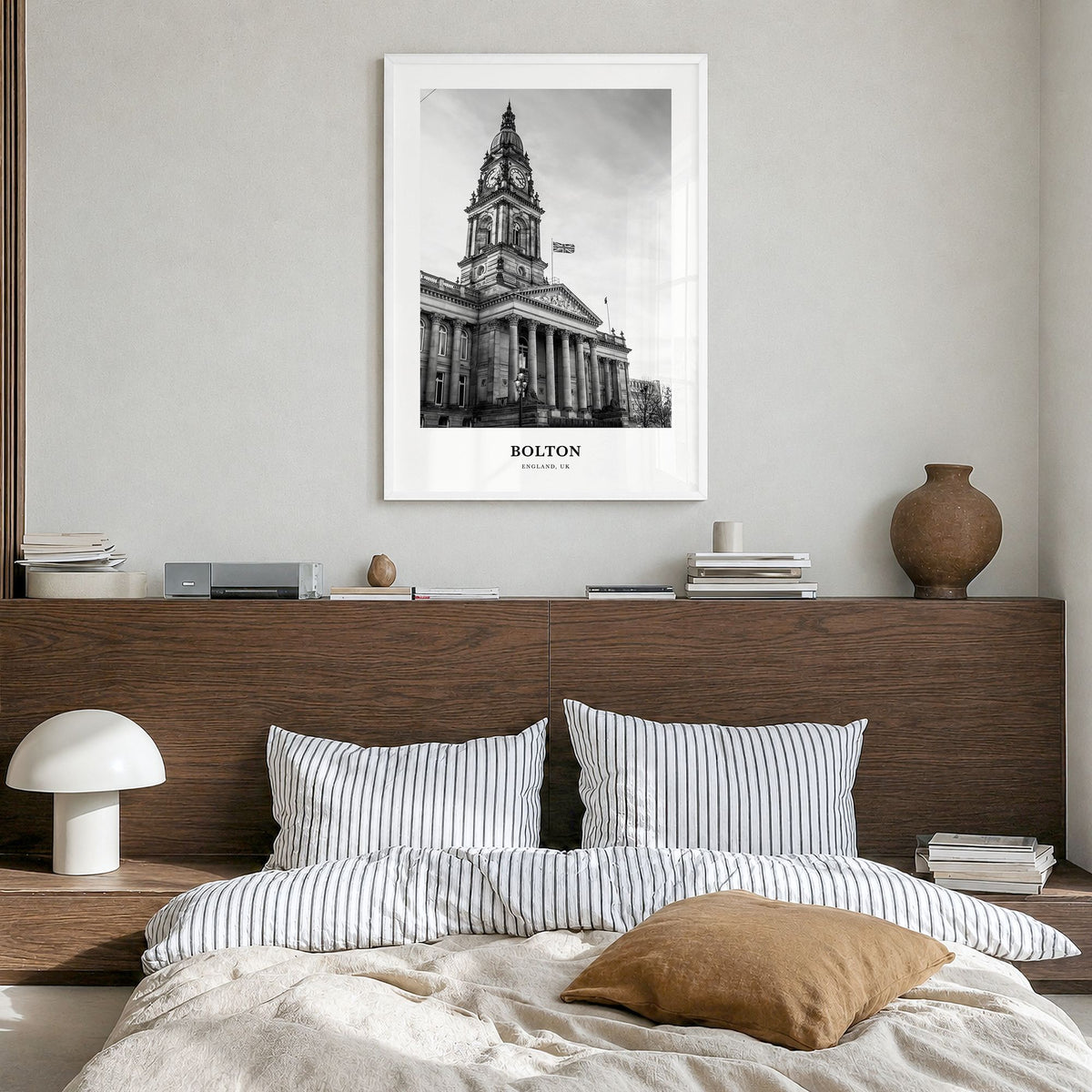Bolton Classic Poster in a white wood frame, hanging in a bedroom