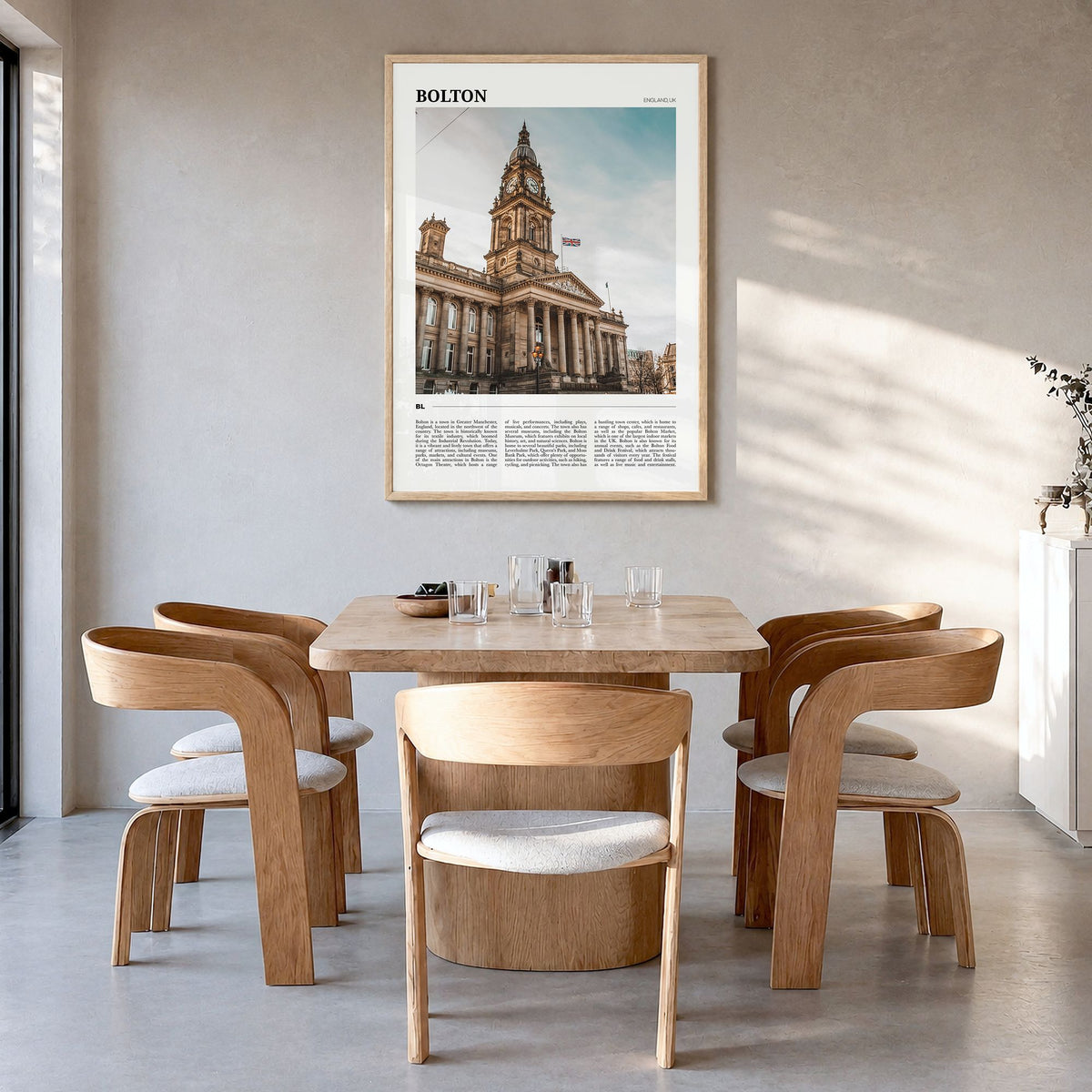 Bolton Travel Poster in a natural wood frame, hanging in a dining room