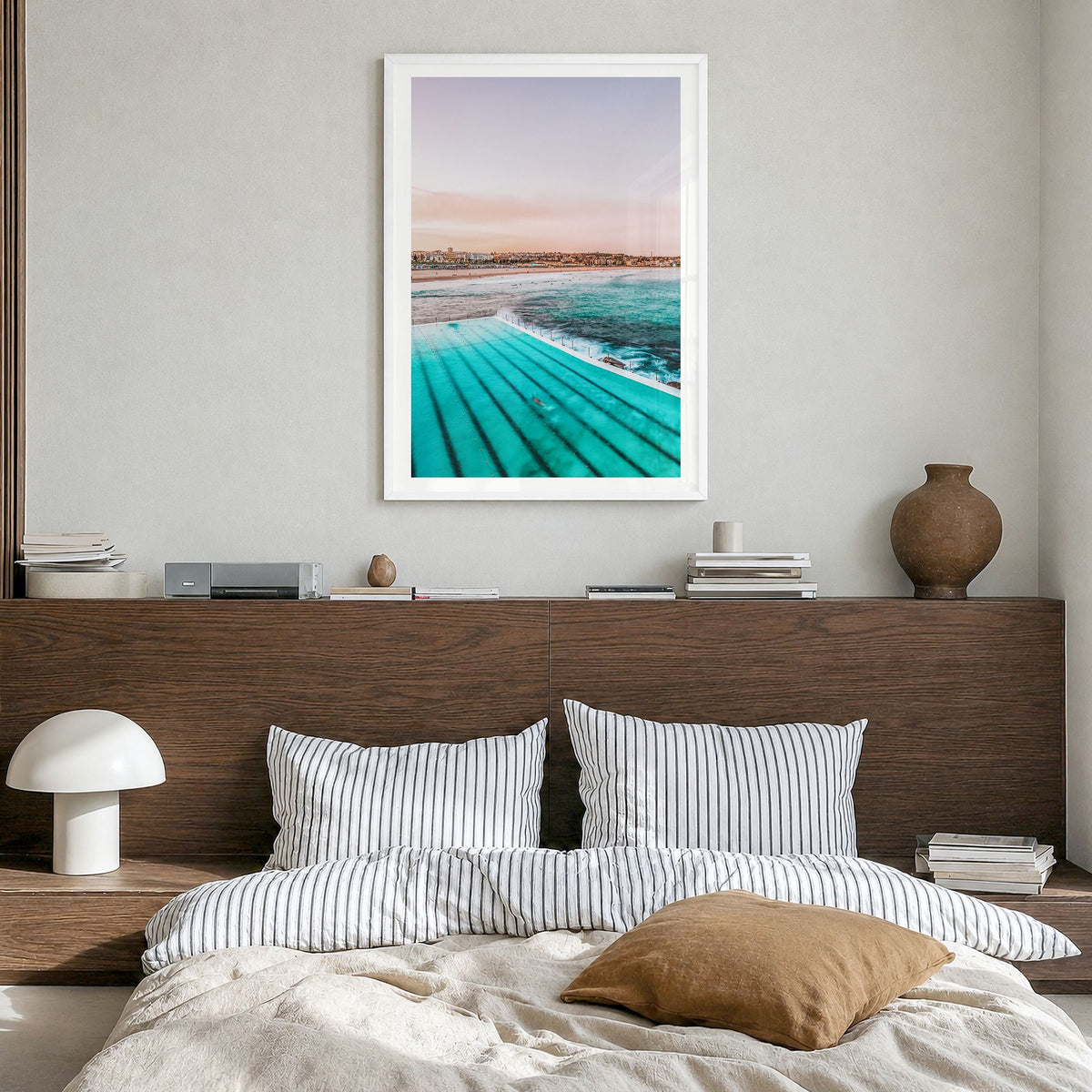 Bondi Beach Photo No 1 Poster in a white wood frame, hanging in a bedroom, white border