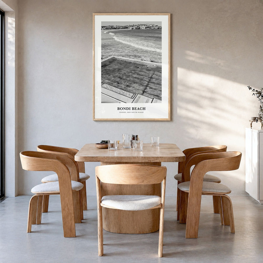 Bondi Beach Classic No 1 Poster in a natural wood frame, hanging in a dining room