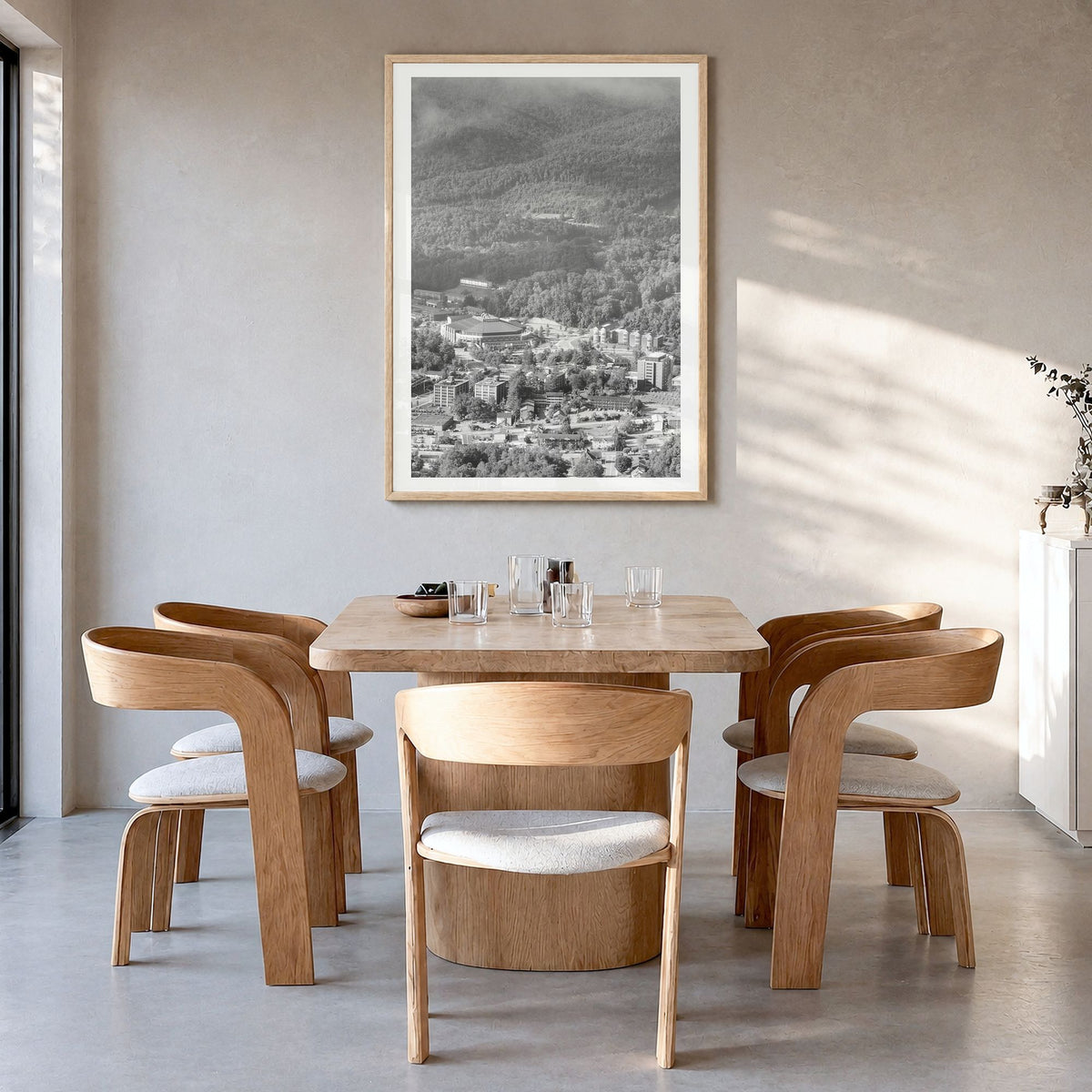 Boone Photo Poster in a natural wood frame, hanging in a dining room, white border