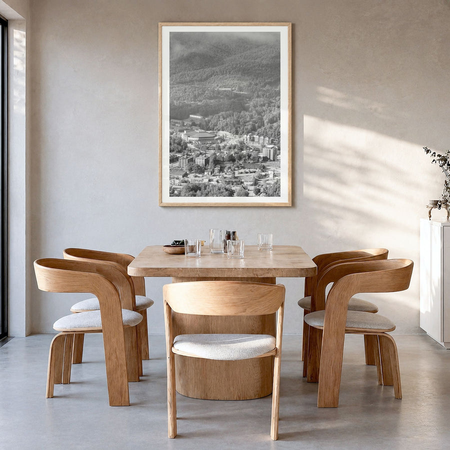 Boone Photo Poster in a natural wood frame, hanging in a dining room, white border