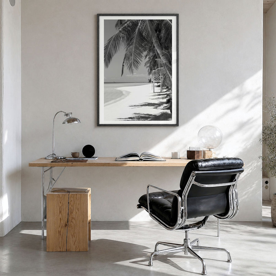 Boracay Photo Poster in a black wood frame, hanging in a bright home office, white border