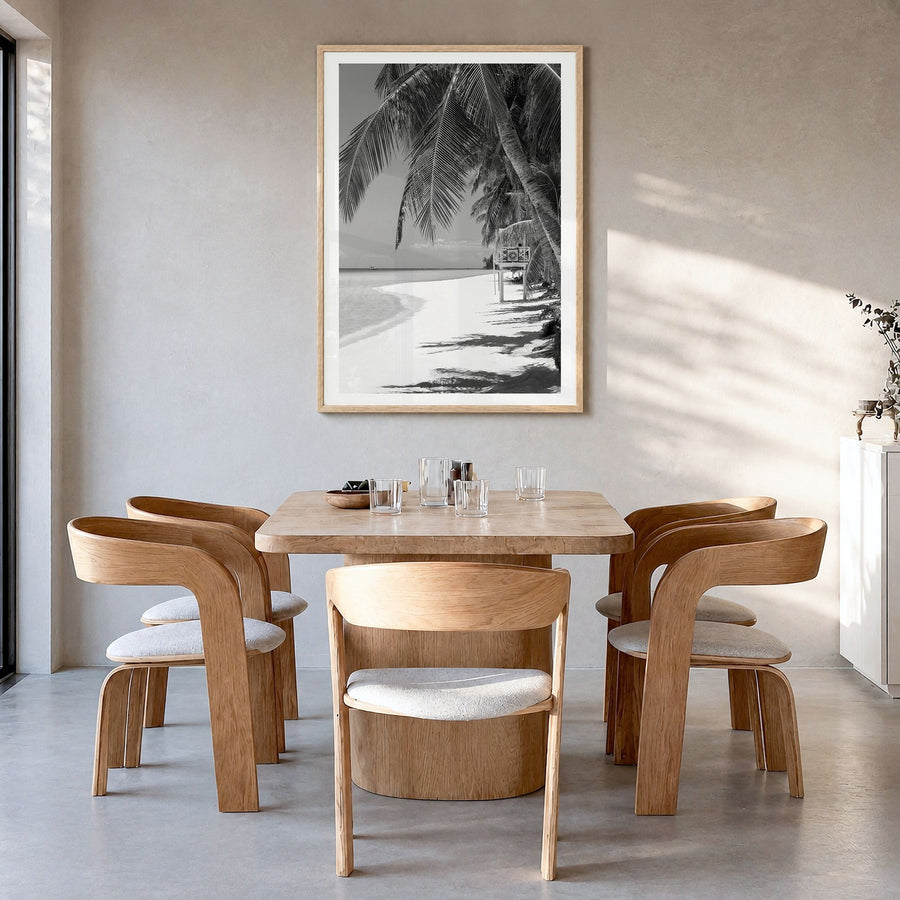 Boracay Photo Poster in a natural wood frame, hanging in a dining room, white border