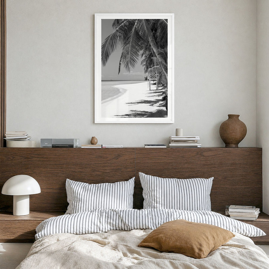 Boracay Photo Poster in a white wood frame, hanging in a bedroom, white border