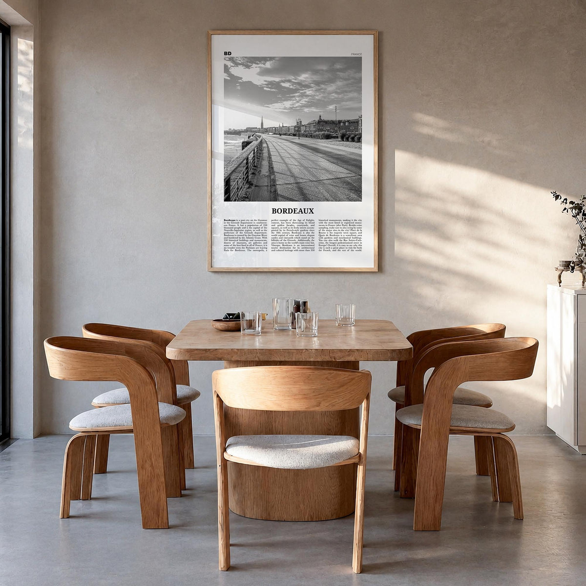 Bordeaux no. 2 black & white newspaper poster of France – vertical wall art in natural wood frame, hanging on wall