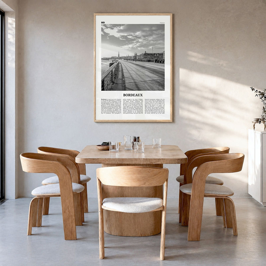 Bordeaux Newspaper No 2 Poster in a natural wood frame, hanging in a dining room