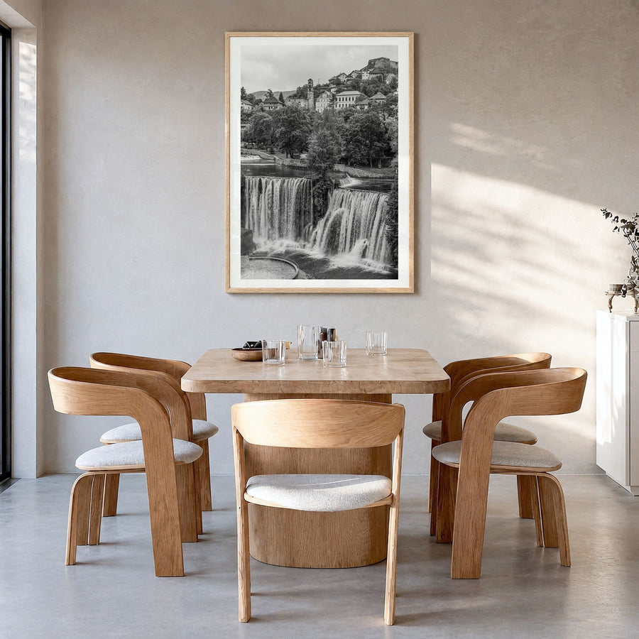 Bosnia and Herzegovina Photo Poster in a natural wood frame, hanging in a dining room, white border