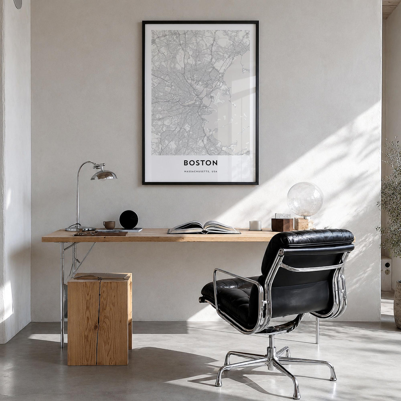 Boston black & white map poster of Massachusetts, USA – vertical wall art in black wood frame, hanging on wall