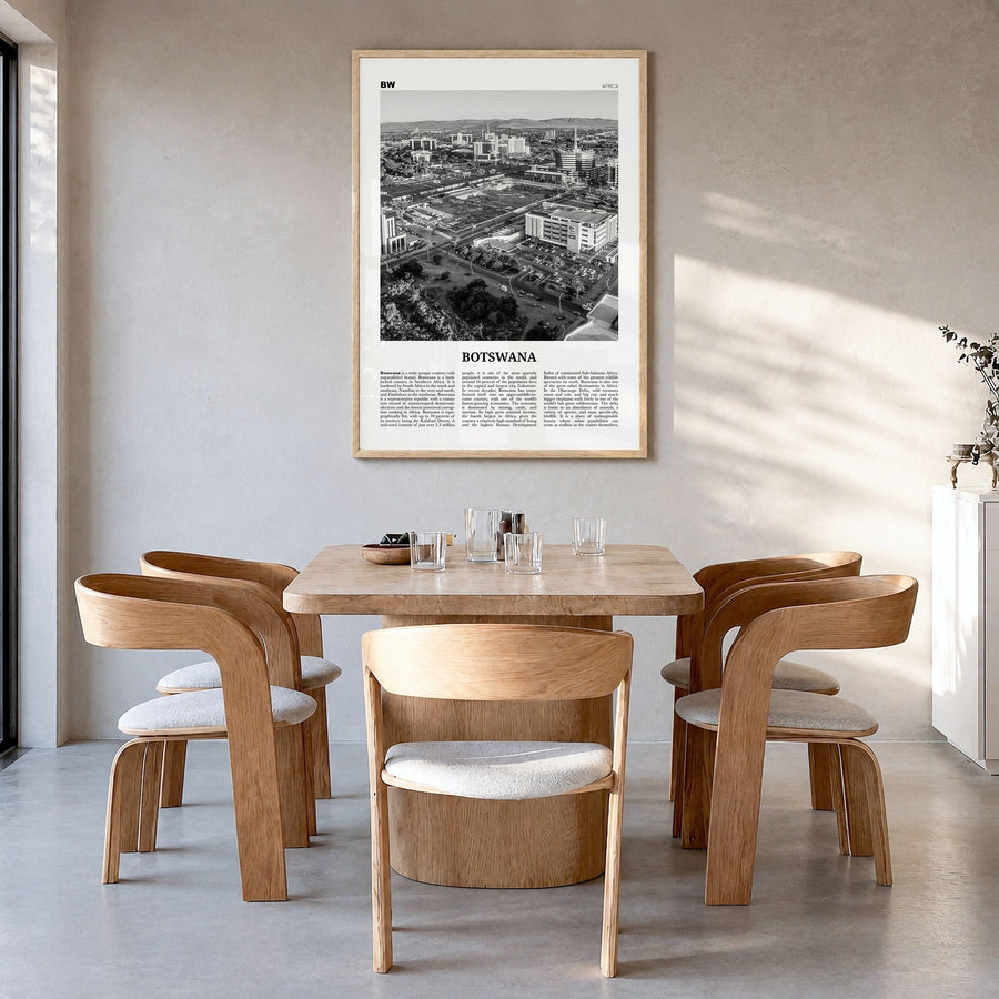Botswana Newspaper Poster in a natural wood frame, hanging in a dining room