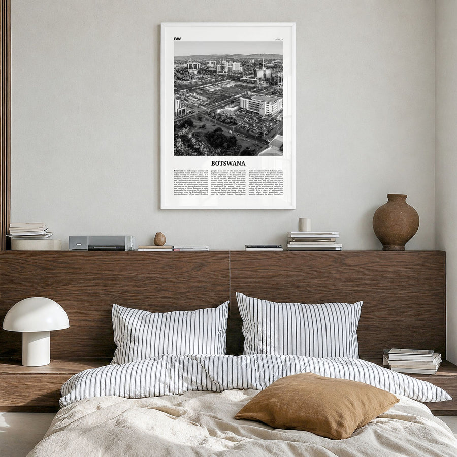 Botswana Newspaper Poster in a white wood frame, hanging in a bedroom