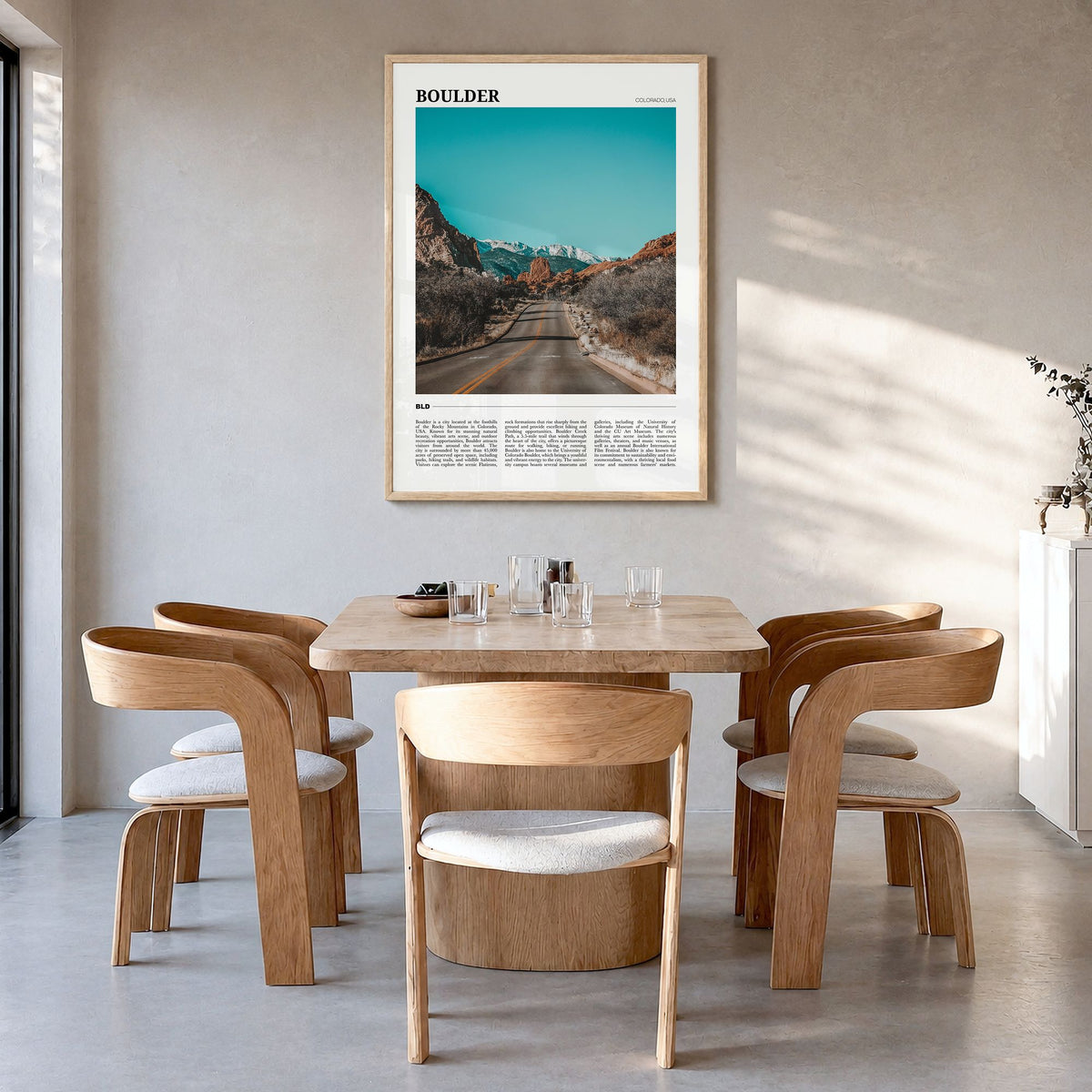 Boulder Travel No 3 Poster in a natural wood frame, hanging in a dining room
