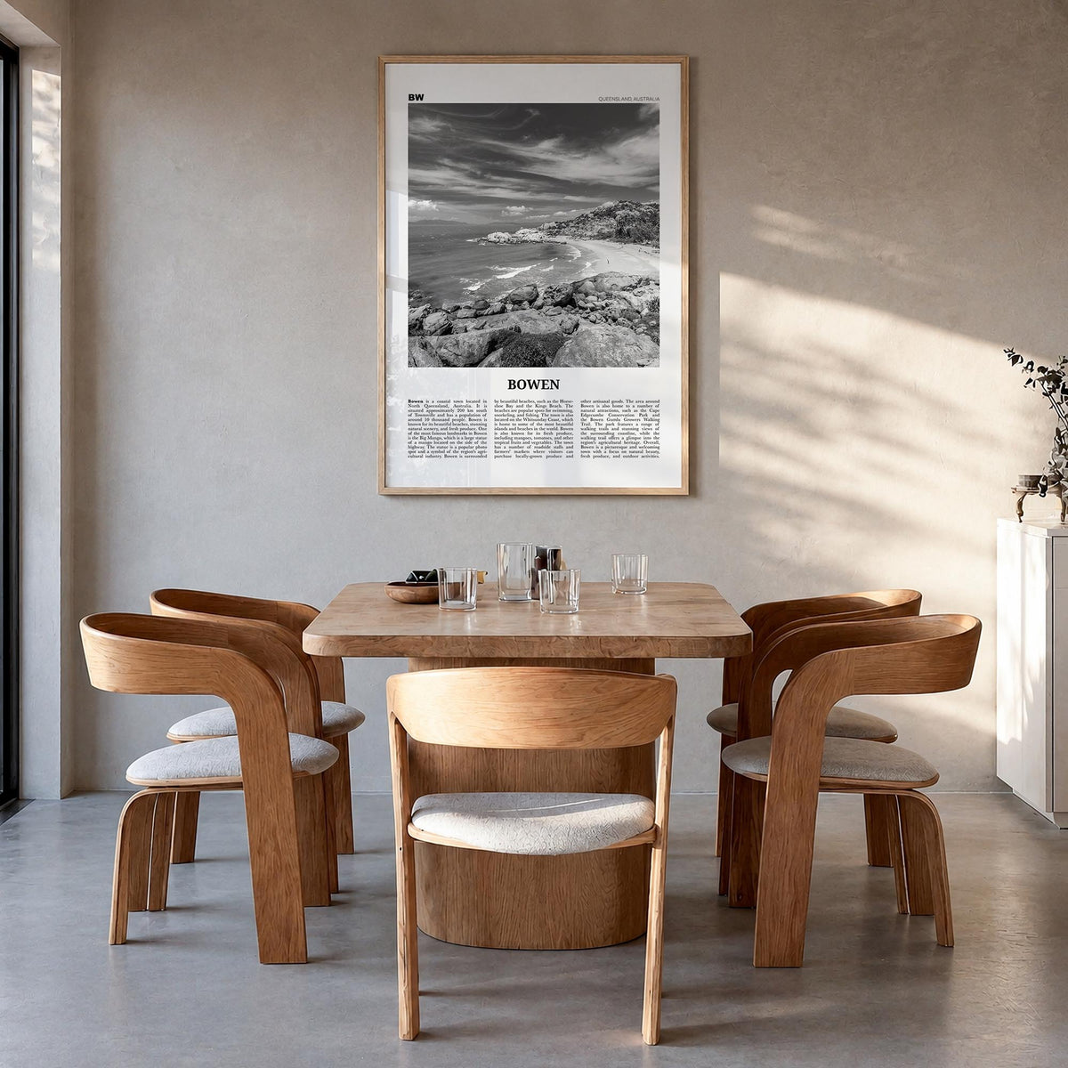 Bowen black & white newspaper poster of Australia – vertical wall art in natural wood frame, hanging on wall