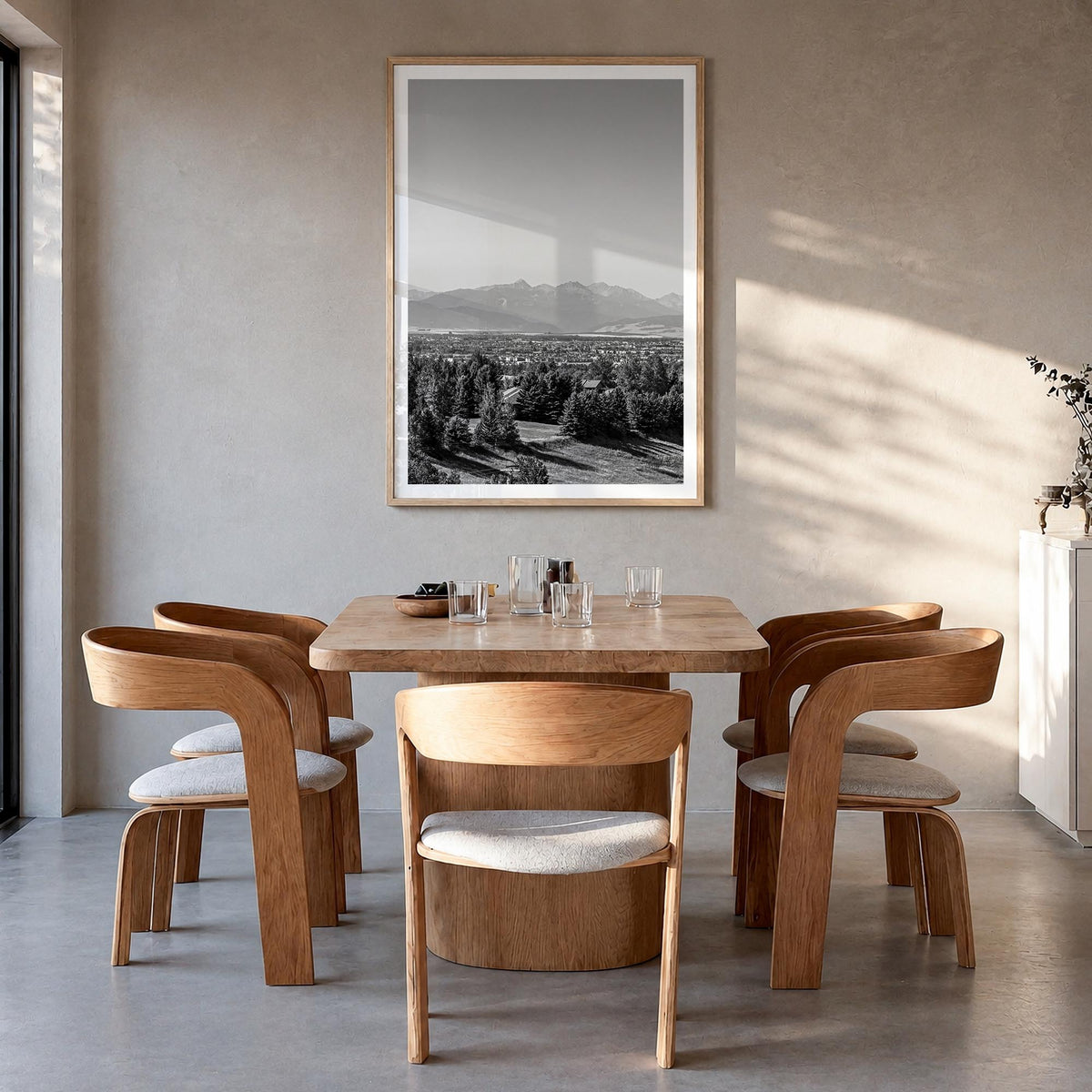 Bozeman black & white photo poster of Montana, USA – vertical wall art in natural wood frame with white border, hanging on wa