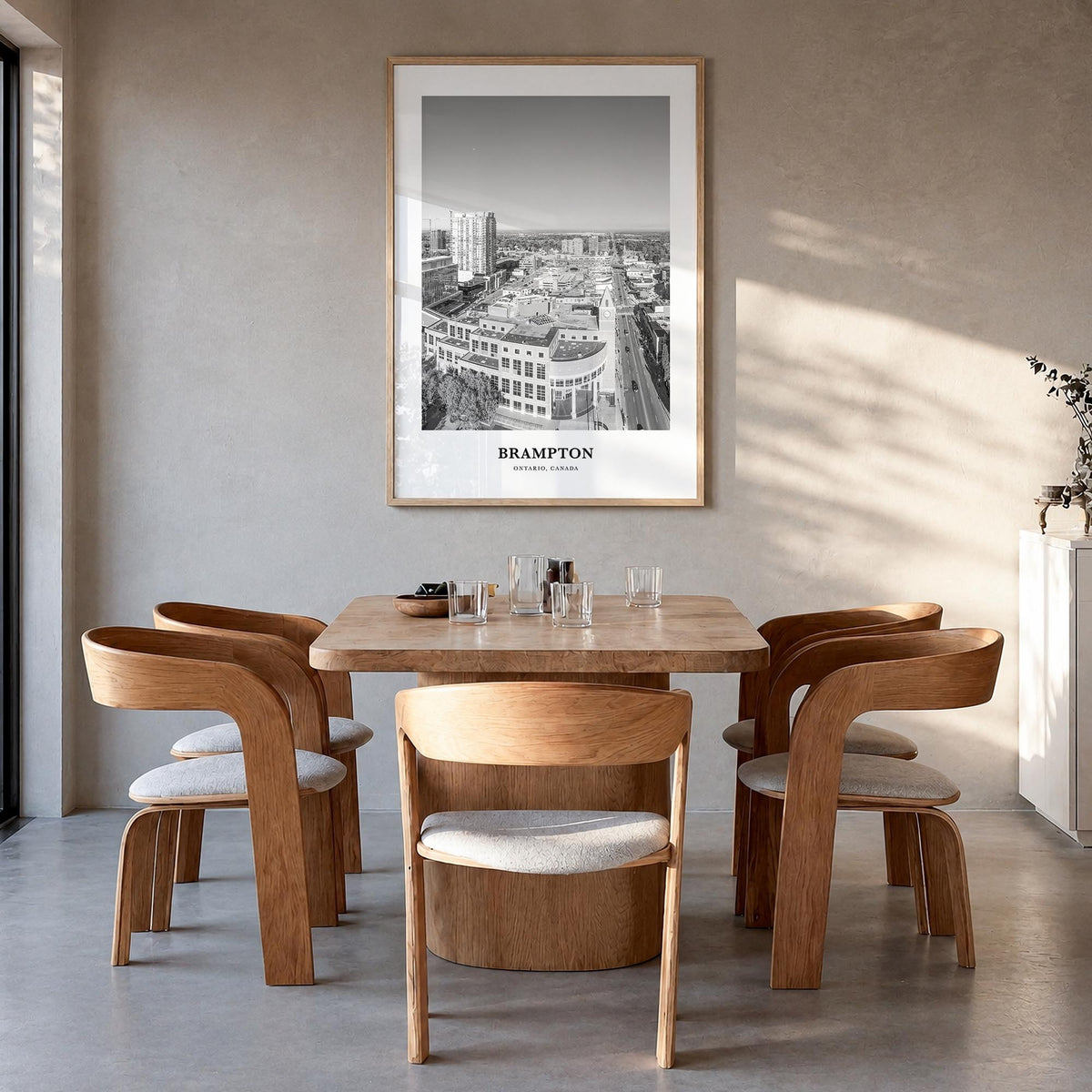 Brampton black & white classic poster of Canada – vertical wall art in natural wood frame, hanging on wall