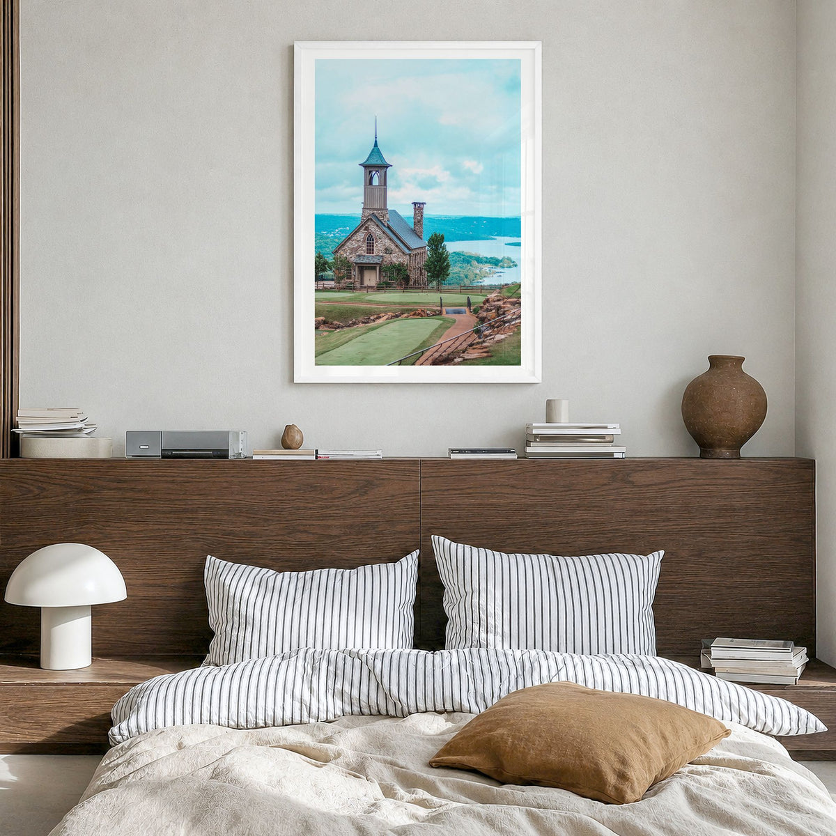 Branson Photo Poster in a white wood frame, hanging in a bedroom, white border
